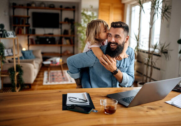 Working father bonding with his daughter Working father bonding with his daughter